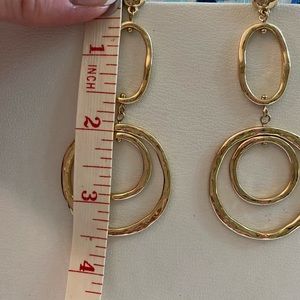 Gold tone dangle earrings
